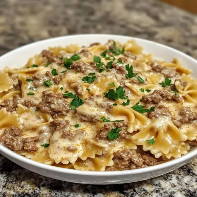 Learn how to make the best Beef and Bowtie Alfredo! This quick, easy, and delicious recipe is perfect for a weeknight dinner. Get the recipe now!