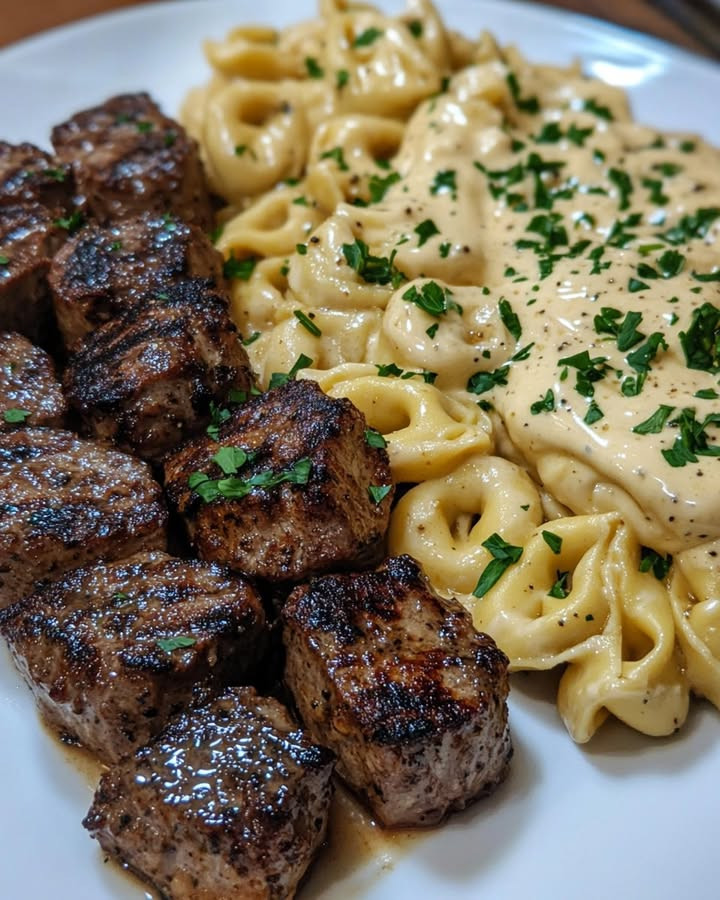 Enjoy Easy Cajun Garlic Butter Steak Bites with Tortellini Alfredo with easy steps and flavor tips Discover