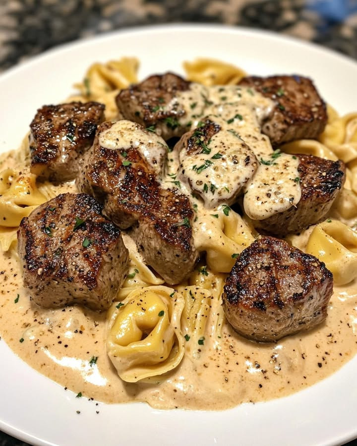 Date night? Why Cajun Garlic Steak Bites with Tortellini Excite Palates pairs steak bites with garlic tortellini—Discover.