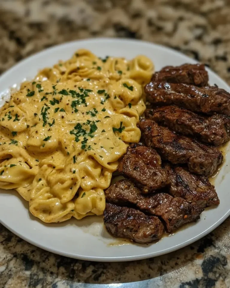 Craving creamy pasta? This 3-step recipe makes Creamy Velveeta Steak Tortellini with Garlic Sauce a breeze! Learn cooking tips now.