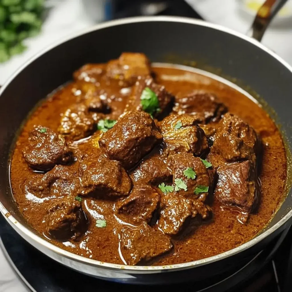 Craving spicy, tangy beef? Make authentic Goan-Style Beef Vindaloo in Spiced Vinegar with our 7-step recipe. Learn vindaloo tips & tricks today!