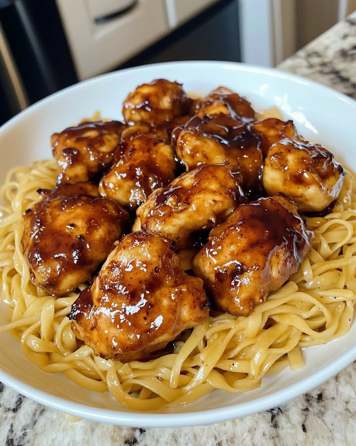 Craving Easy ONE-POT HONEY GARLIC CHICKEN BITES AND NOODLES with easy steps and flavor tips Discover