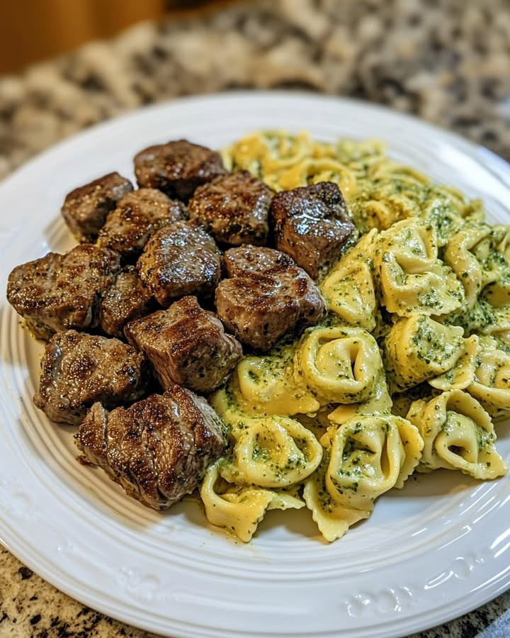 Tasty twist? Why Pesto Alfredo Tortellini with Steak Bites Thrills Taste Buds adds steak to creamy pesto tortellini—Discover.